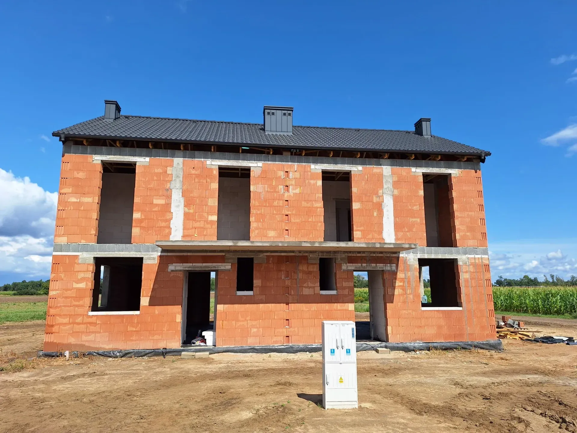 Budowa Osiedla nad Strugą – pokrycie dachu, sierpień 2024