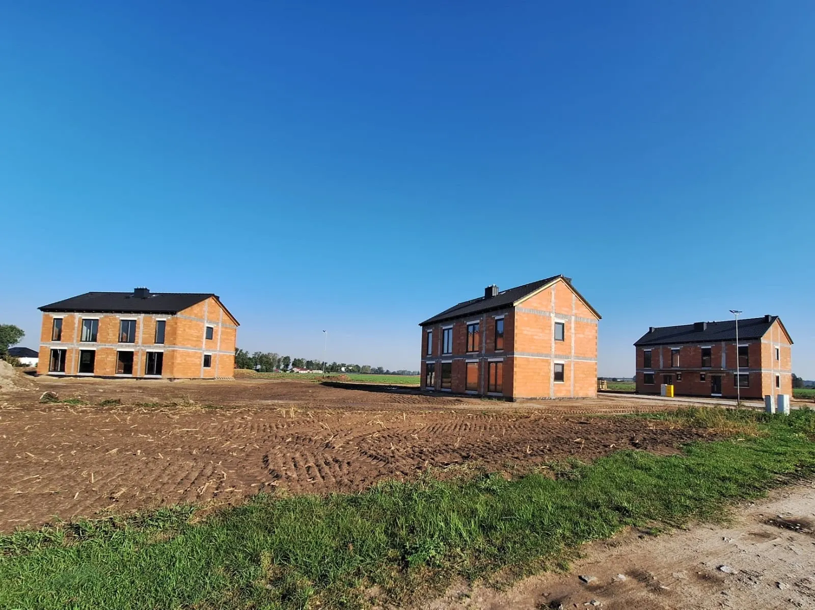 Budowa Osiedla nad Strugą – ocieplenie domów, październik 2024